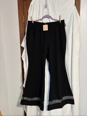 BloomChic Black Flared Trousers with Sheer Hem
